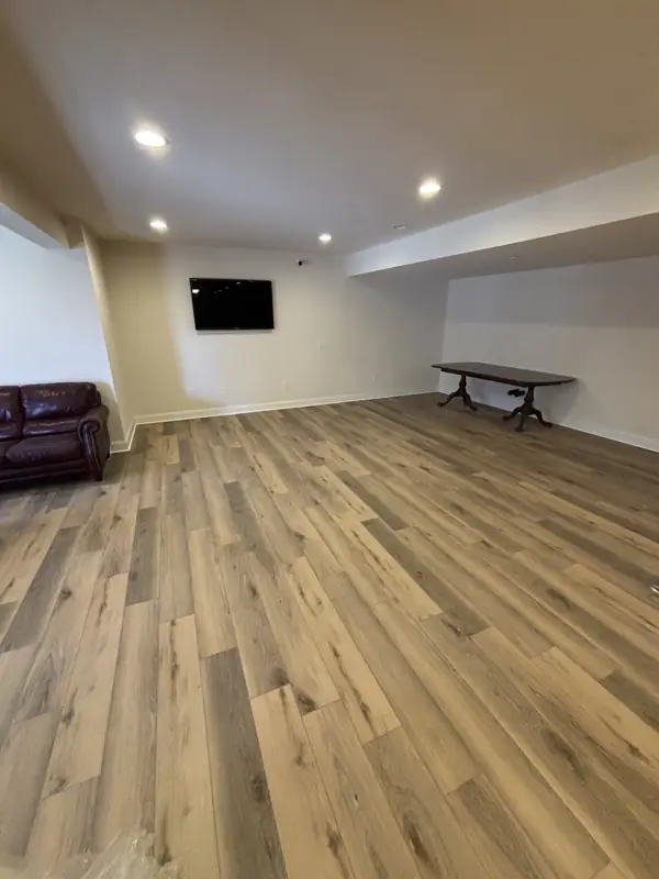 Finished basement with new flooring