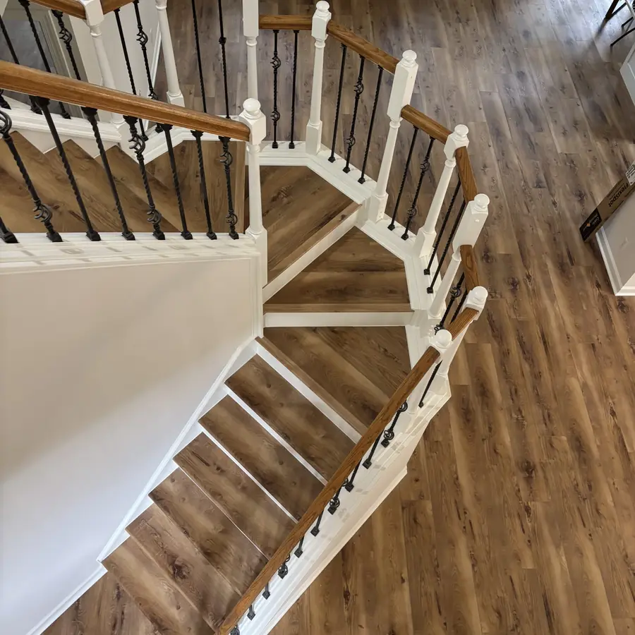 Staircase and landing finished with matching floors by Barefoot Floors