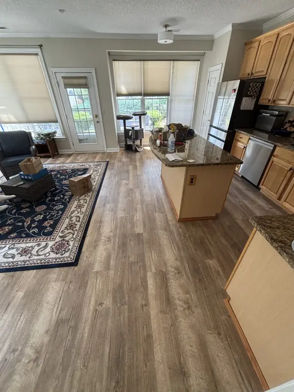 Kitchen and family room with new flooring